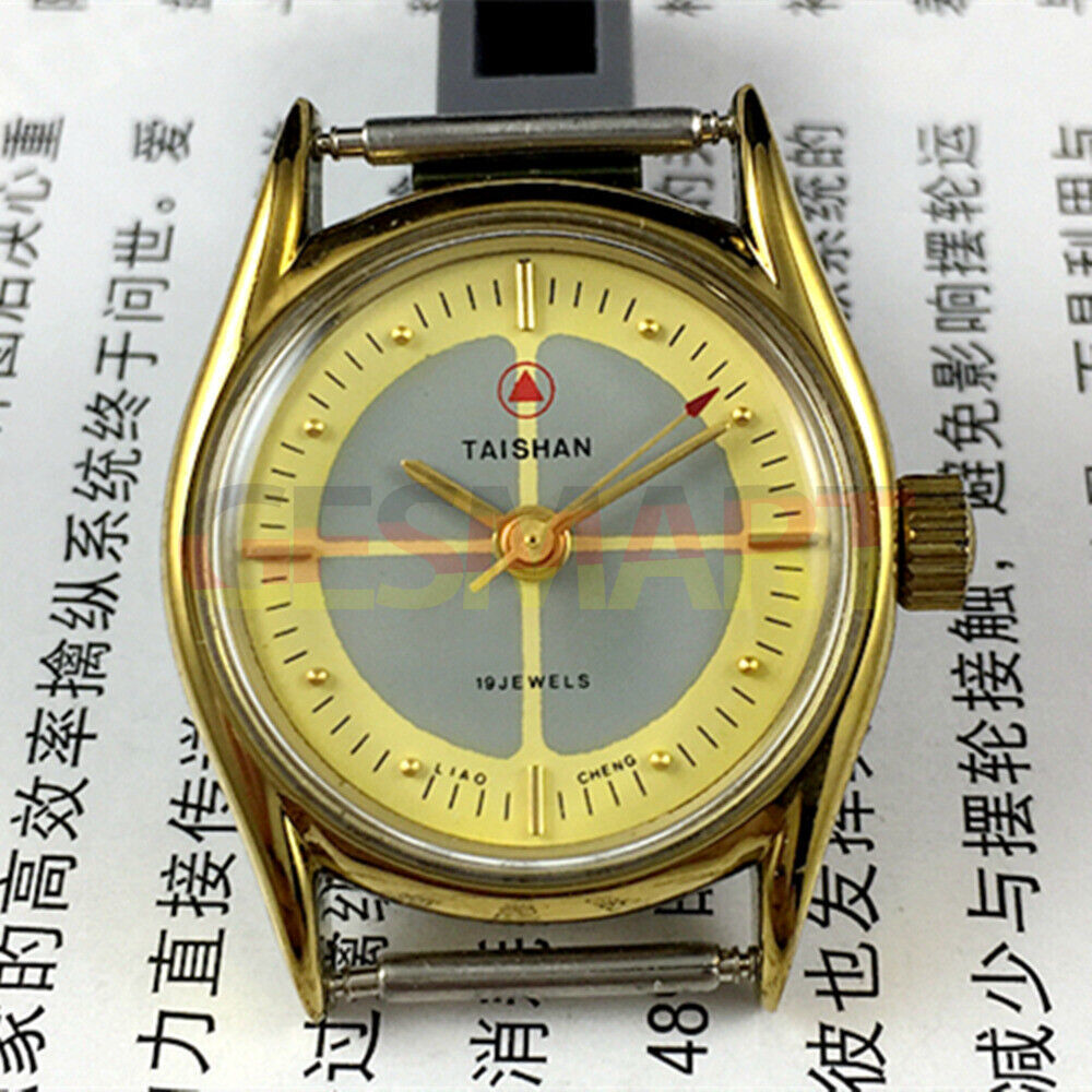TAISHAN mechanical lady watch with 19 jewels, yellow-grey dial, and round golden case for elegant style.