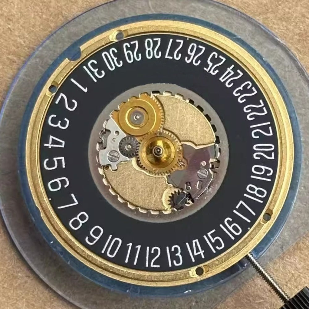 Swiss Made ETA955.412 quartz watch part with black disk date at 6, precise 3-hand movement by ETA