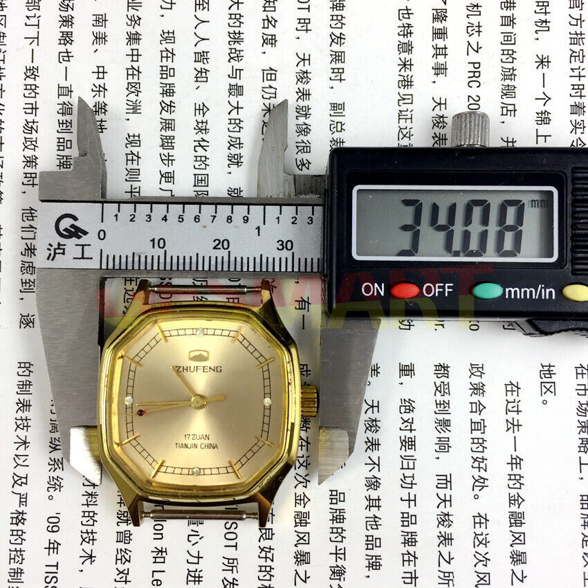 34mm Octagonal golden nail case mechanical watch by Tianjin Zhufeng, manual winding design.