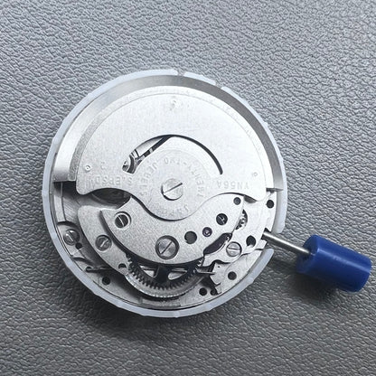 Japan Epson YN56 mechanical watch movement showing date and day display at 3 o'clock, precise and reliable.