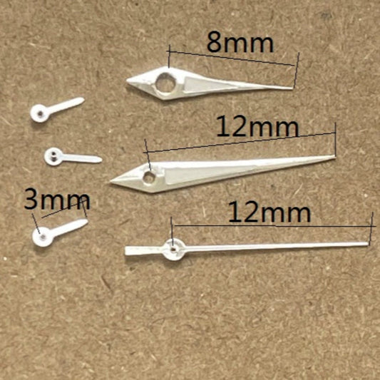 Silver trim arrow-shaped watch hands for Miyota JS15 quartz movement, precise accessory detailing.