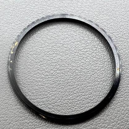 Black stainless steel chapter ring 34.9mm x 31.0mm x 1.9mm for watch accessory.