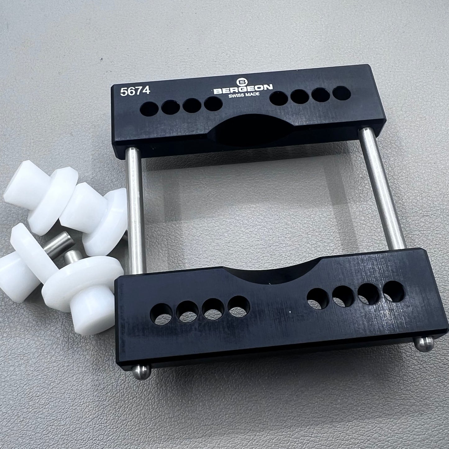 Swiss Bergeon 5674 vise jaws holder for secure watch case clamping, ideal for precise repair tasks.