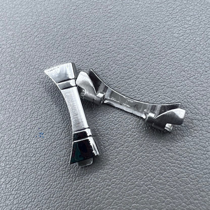 Polished curved end links spring bars set by for watch band strap replacement.