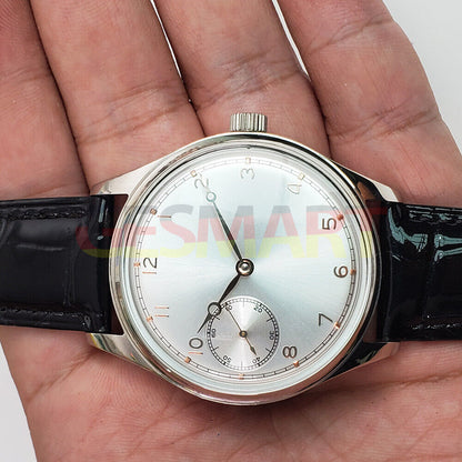 Seagull 42mm men's watch with manual ST3600 movement, white dial, and elegant chain-up bracelet.
