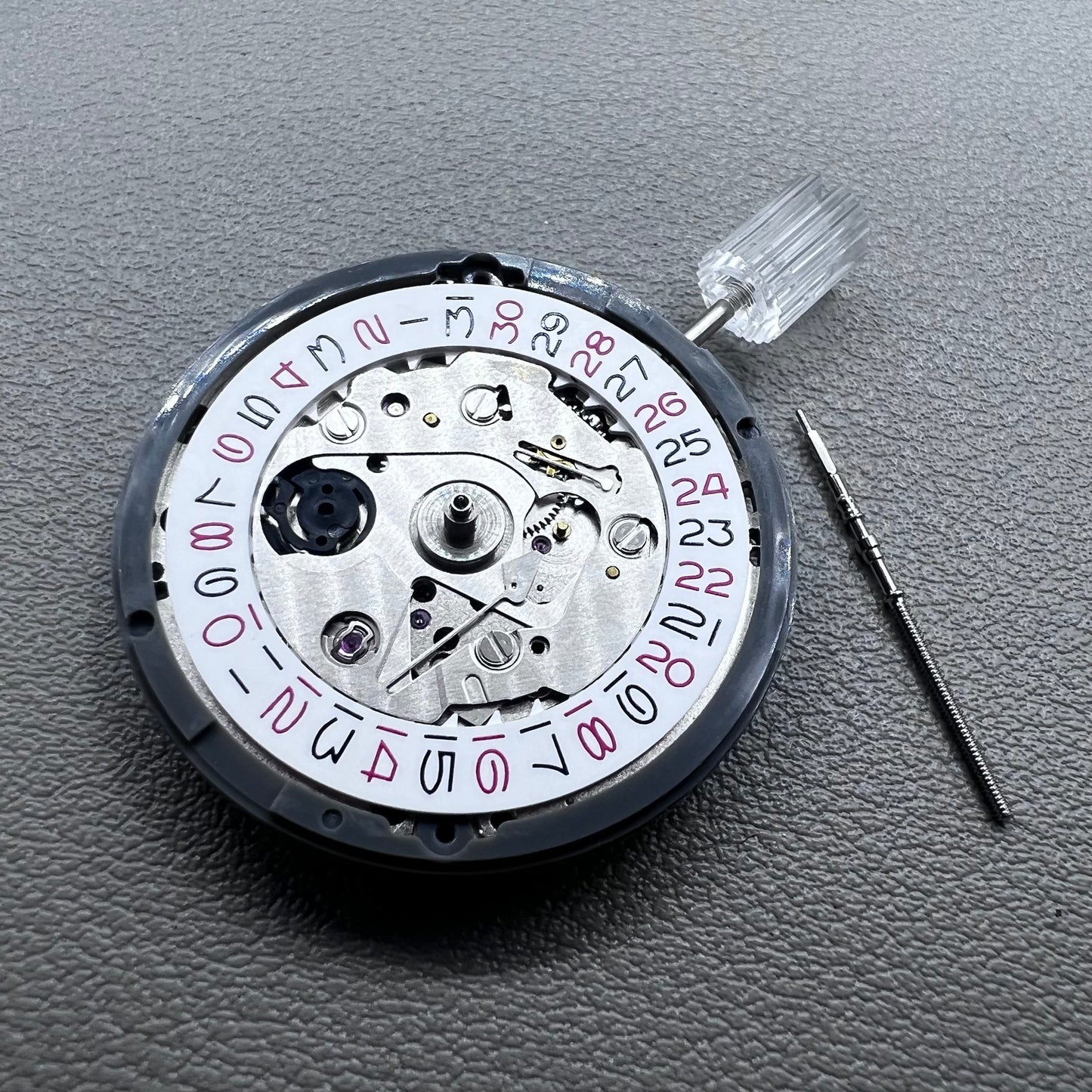 Seiko NH35 watch accessory showcasing red even number dial with high-accuracy automatic mechanical movement.