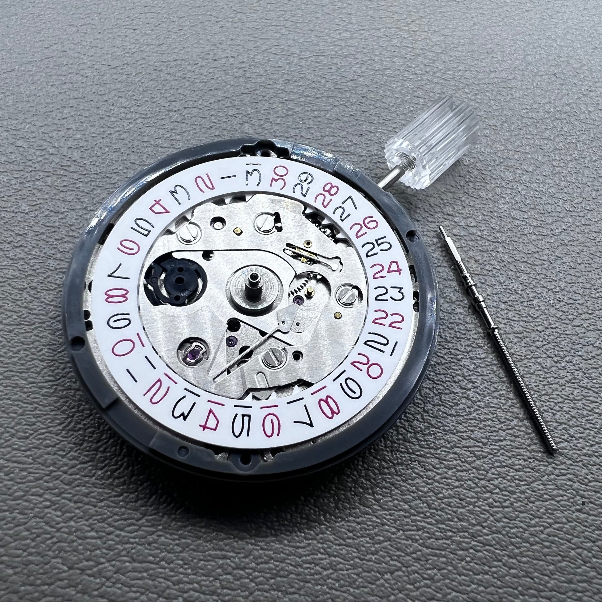 Seiko NH35 watch accessory showcasing red even number dial with high-accuracy automatic mechanical movement.