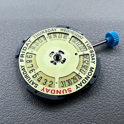 Japan Miyota 6M50 Quartz watch movement with golden dial, date at 6 o'clock, 3 hands, precise timekeeping.