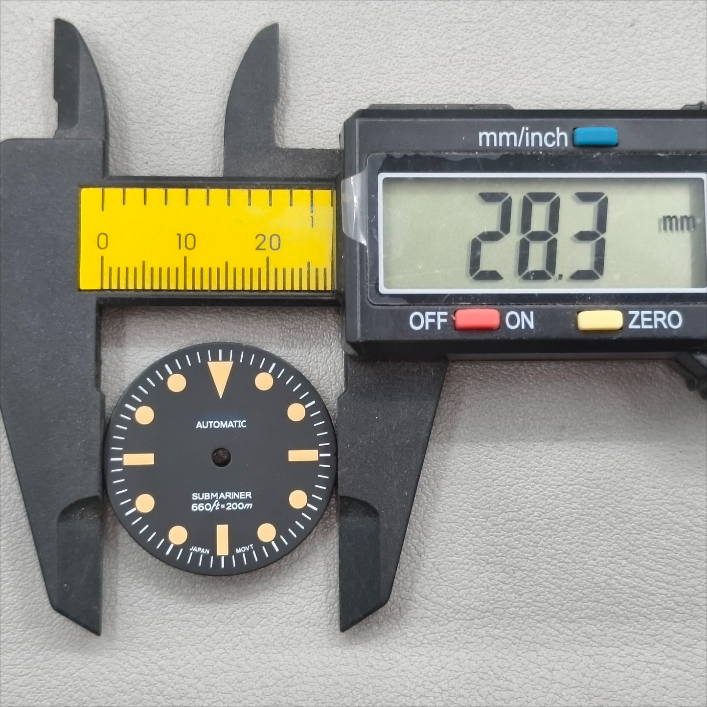 watch dial with S logo