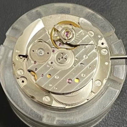 ETA 7750 automatic chronograph movement with day-date at 3 o'clock, precision watch mechanism.