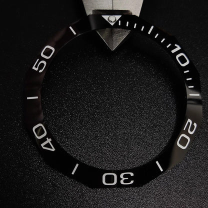 Sloping luminous ceramic bezel insert 42.3x33.3mm for automatic watch replacement, precise fit and durability.