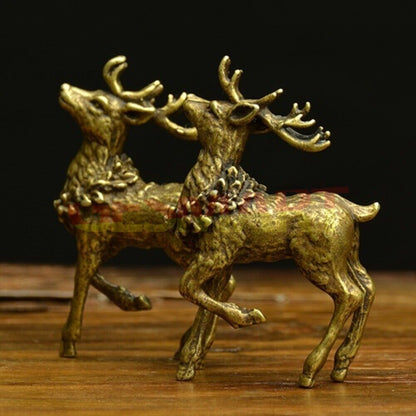 Pair of hand-carved copper Sika deer figurines, bronze finish, perfect decorative trinkets.