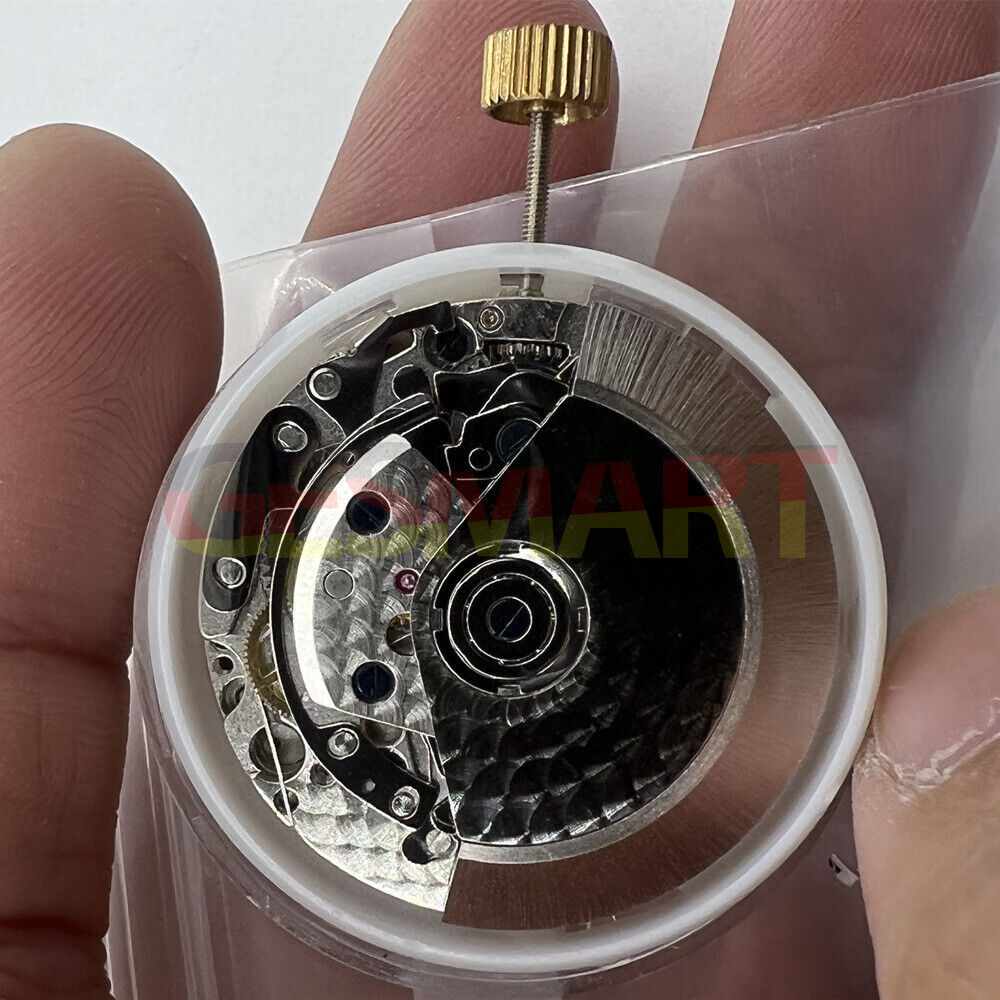 Close-up of Asian 7750 Chronograph Movement with white dial, single calendar, and second subdial @9, ETA style.