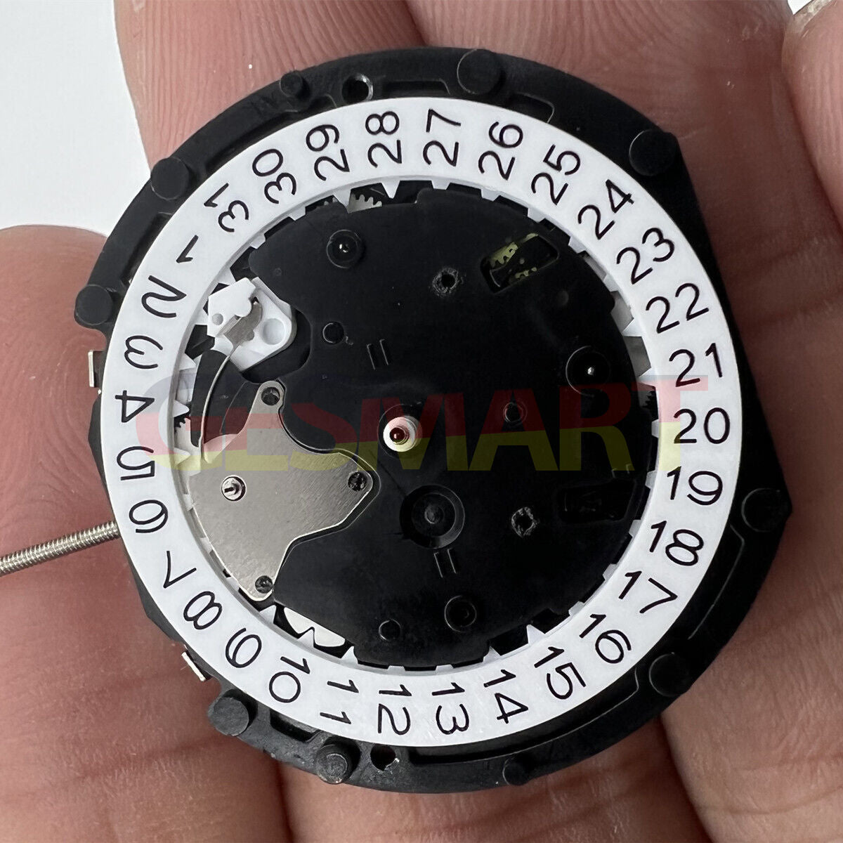 Sunon PE90 quartz watch movement with 3 hands, date at 3, small seconds at 3, 6, and 9 o'clock positions.