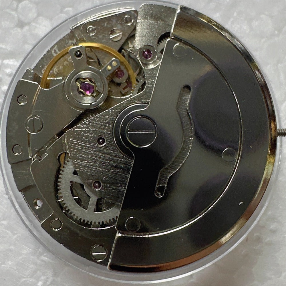 China Made 2813 8205 mechanical watch movement with black day-date disk and Arabic numerals at 6 o?clock.