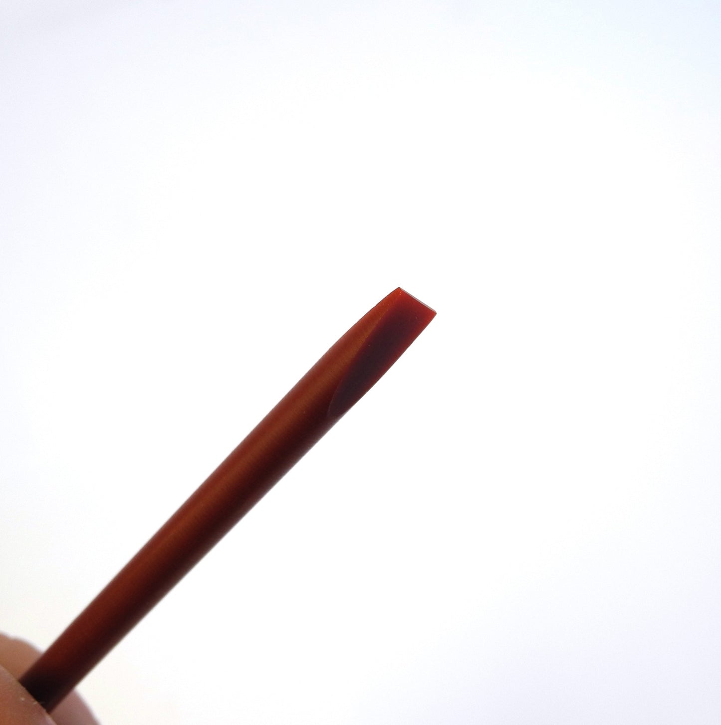 Bergeon 7216 natural cleaning stick gently removes smudges from watch glasses, Swiss-made accessory for precision care.