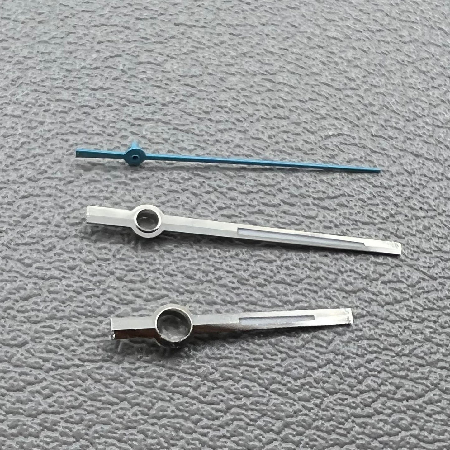 Blue second and silver-trimmed green lume hands set for Miyota 8285 movement.