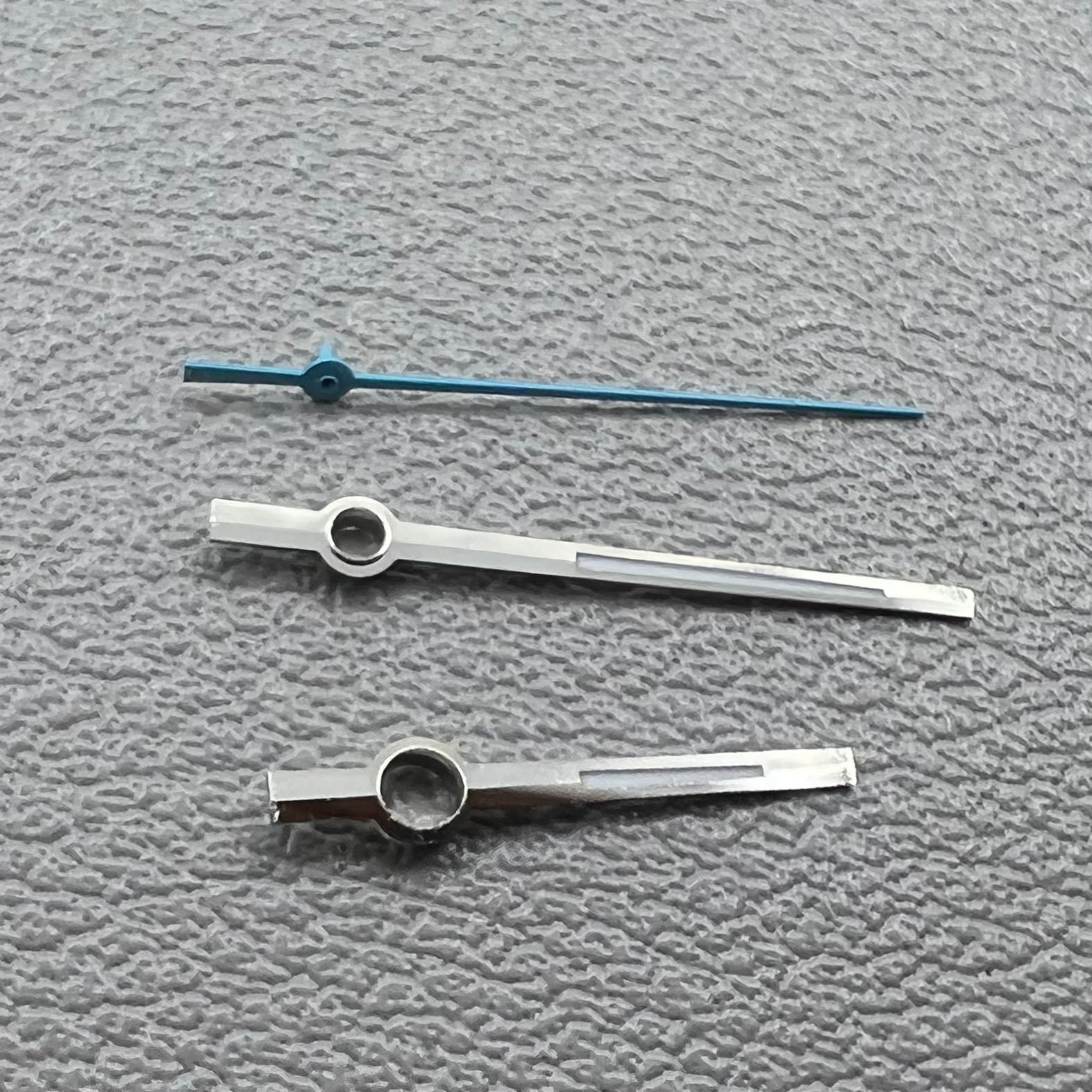 Blue second and silver-trimmed green lume hands set for Miyota 8285 movement.