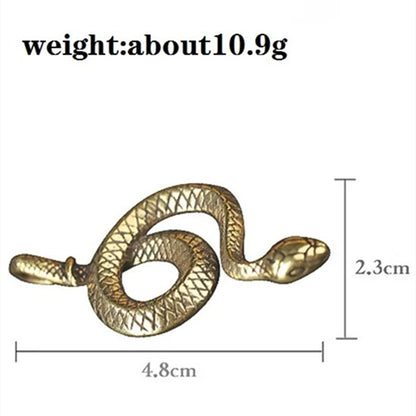 Hand carved vintage bronze snake figurine, solid copper with detailed scales and antique finish.