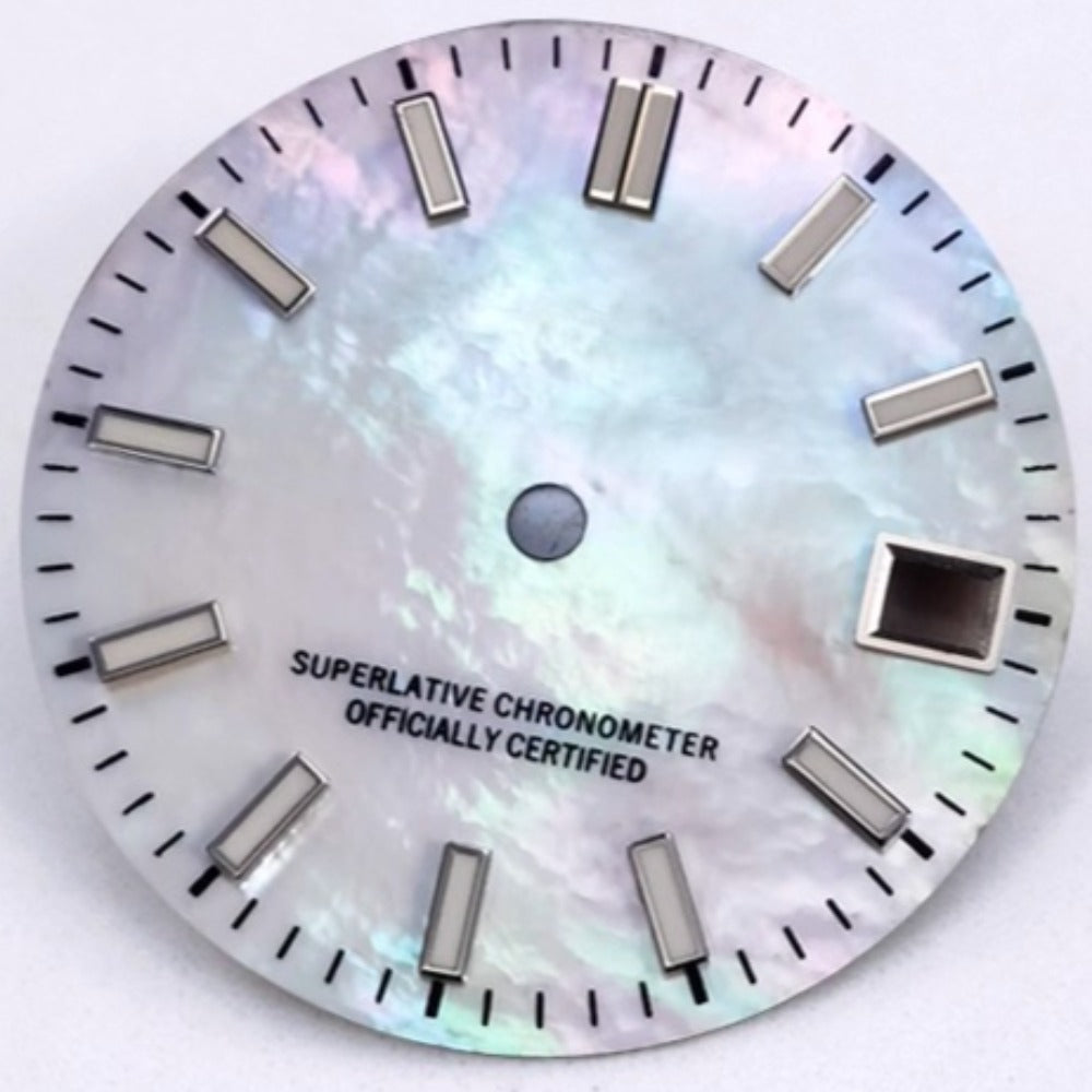 Silver 28.5mm NH35 watch dial with blue lume, natural seashell vein texture, perfect for modified timepieces.