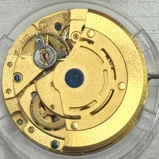 China Made 8205 2813 mechanical watch movement with single calendar and golden wheel, precision timekeeping component.