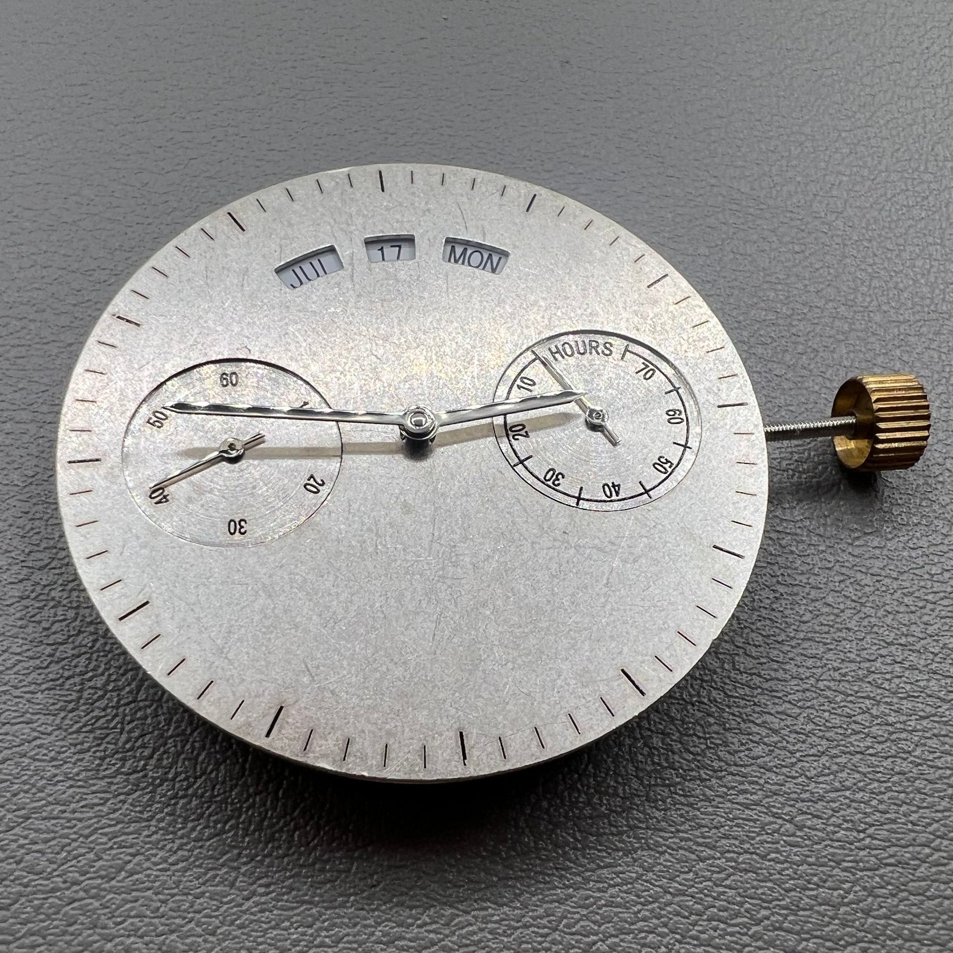 Perpetual Calendar watch movement by Dandong, precision replacement part for timepieces.