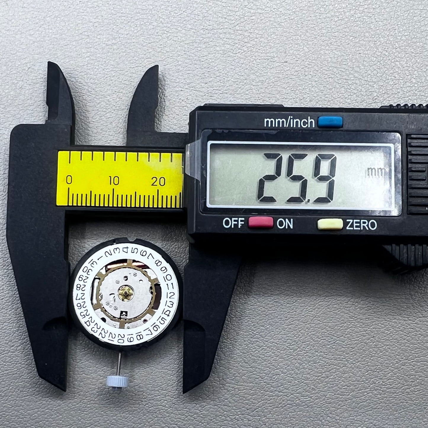 Swiss Ronda 715 quartz watch movement with date display at 3 o'clock, precision timing for accessories.