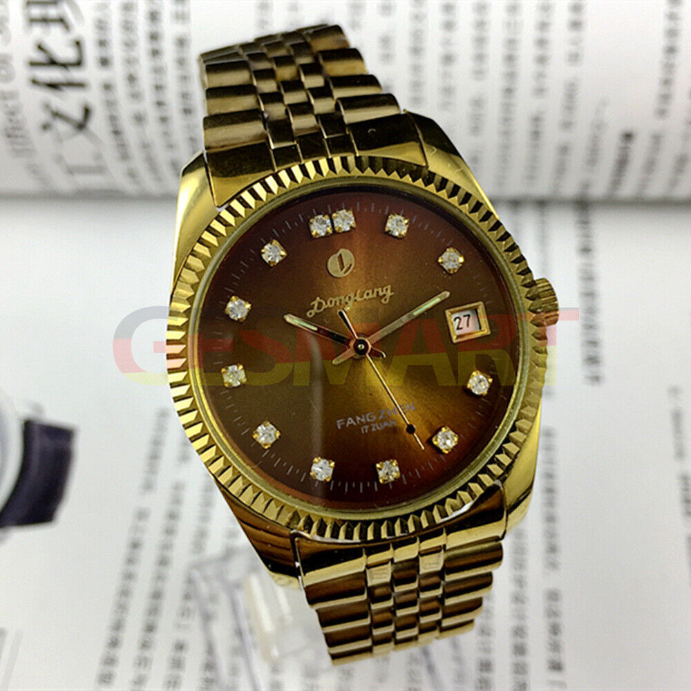 Brown dial 36mm Donglang manual mechanical watch featuring 17 jewels and single calendar, classic style.