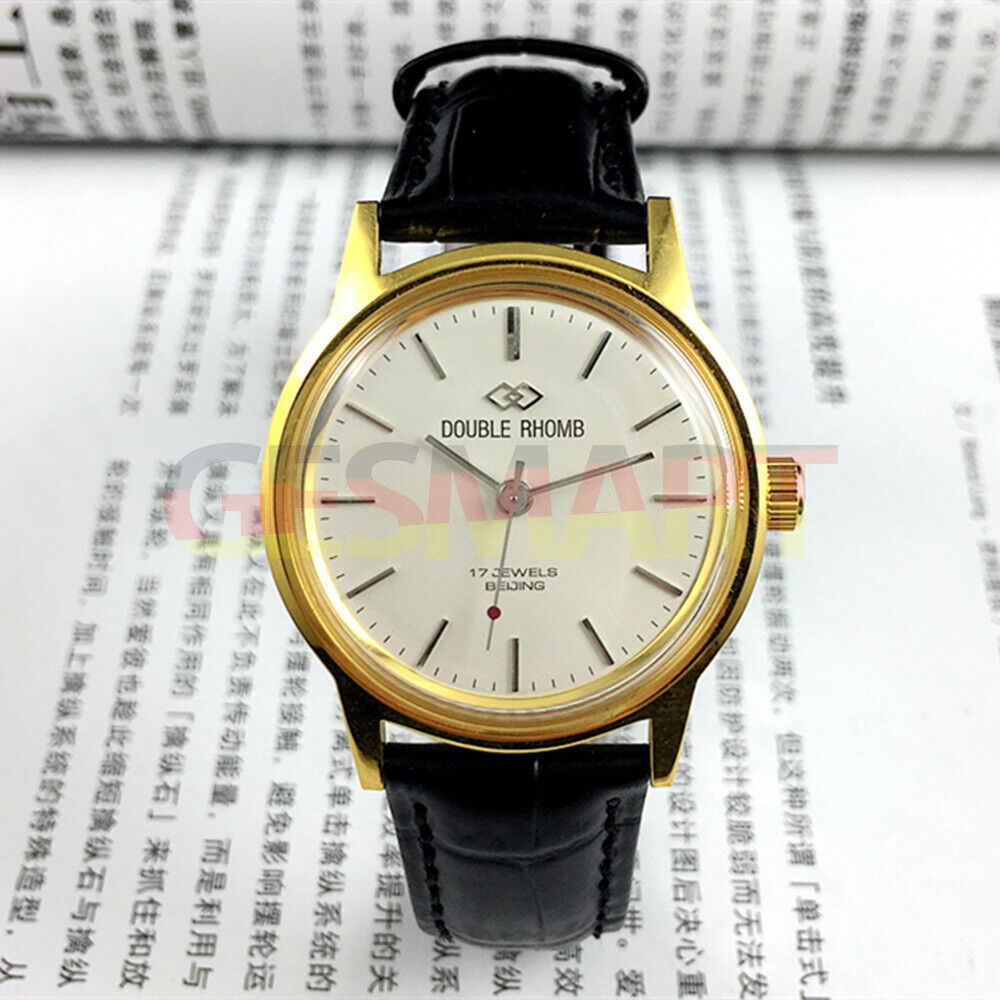Beijing Double Rhomb manual mechanical watch with golden case, silver nail markers, and classic design for enthusiasts.