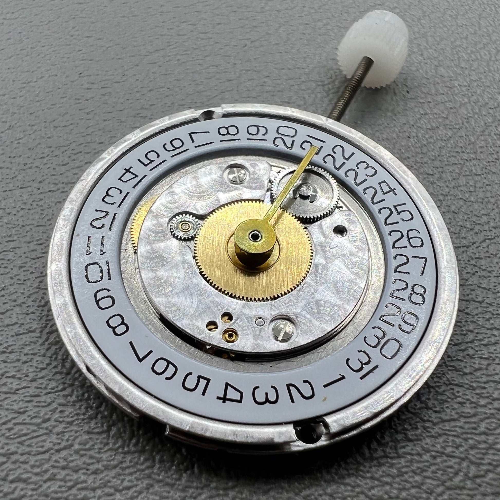 Swiss ETA255.112 quartz movement watch part with single calendar, precision timekeeping by ETA.