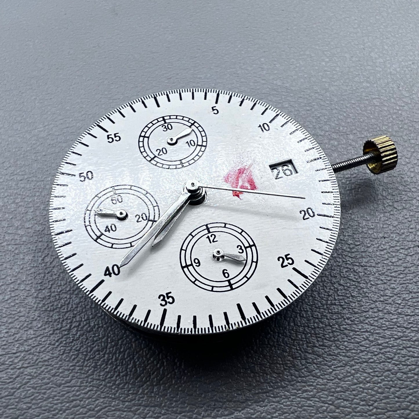 Shanghai 7750 mechanical watch movement with single calendar and small second at 9 o'clock, precision timekeeping.