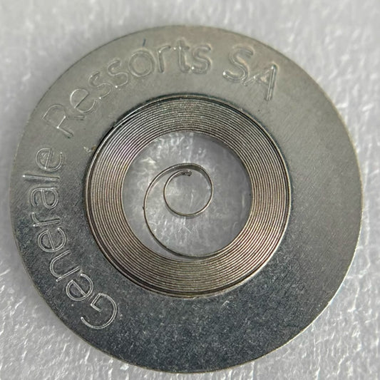 Replacement mainspring for Glashutte39 movement watch, ensuring precise timekeeping and durability.