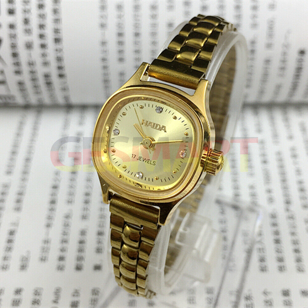 24mm SHANGHAI HAIDA lady watch with golden nails and champagne dial, manual mechanical movement.
