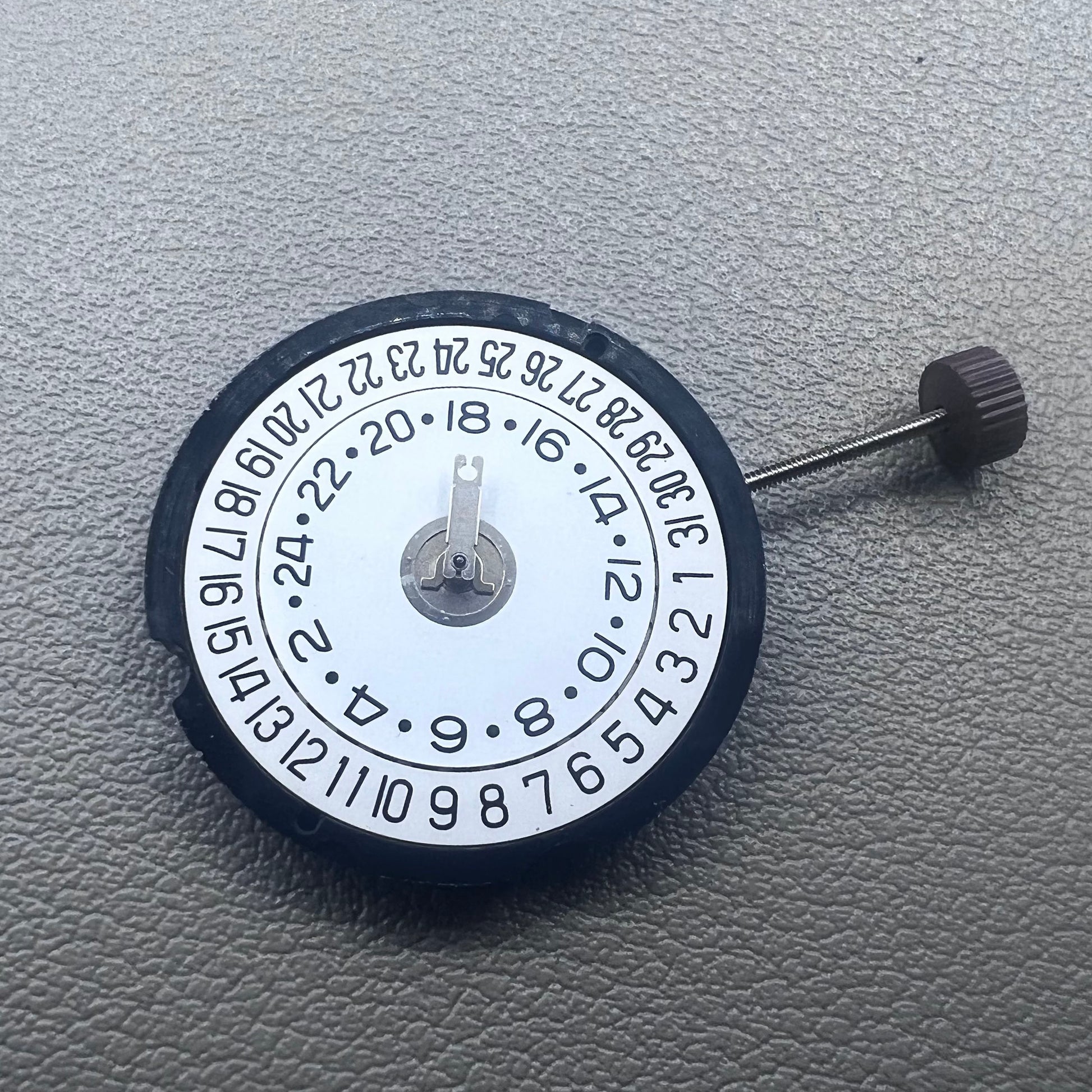 Swiss Ronda 505 24D quartz watch movement with date at 6 o'clock, precision timekeeping for accessories.