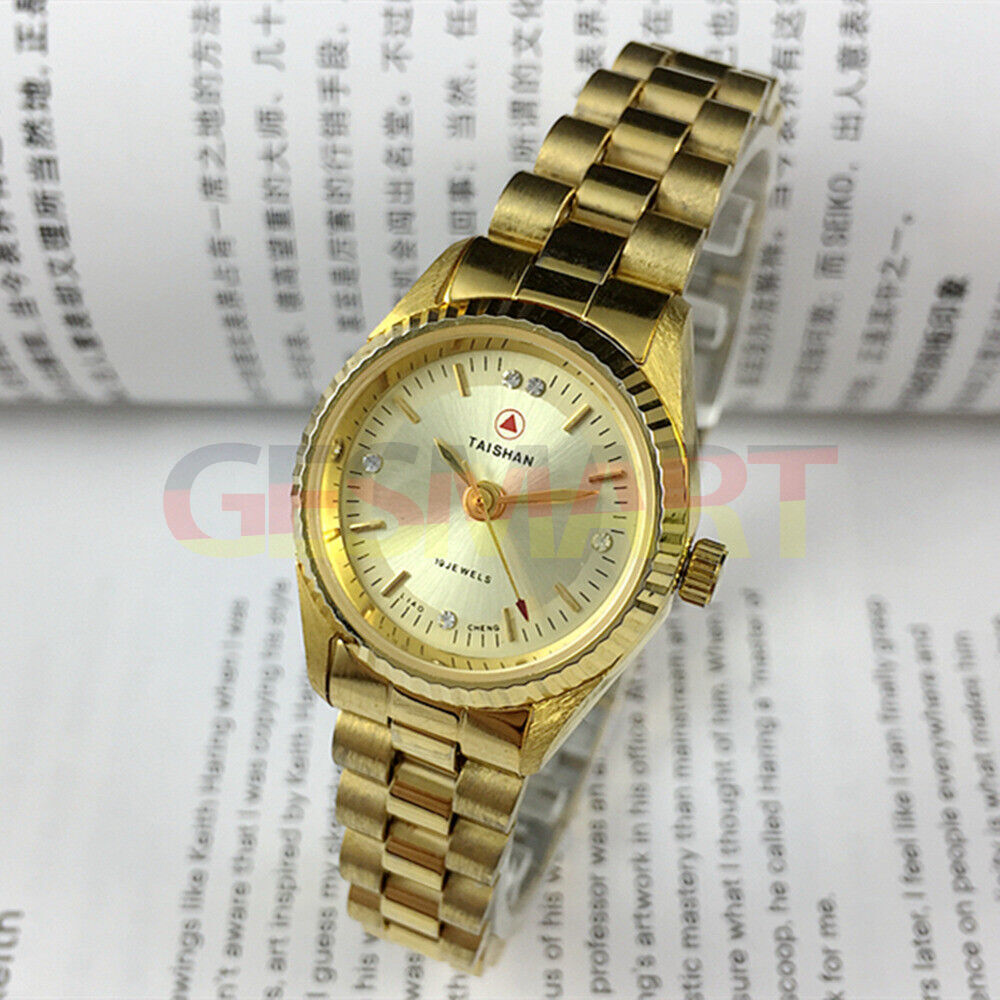 Elegant 27mm TAISHAN manual mechanical lady watch with imitation diamond markers, perfect for stylish wear.