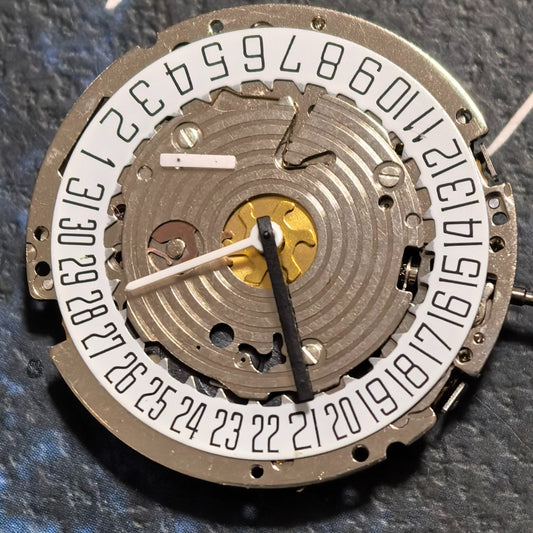 Swiss ISA 8171A quartz watch movement with 4 hands and date display at 6 o'clock, ideal for precision repairs.