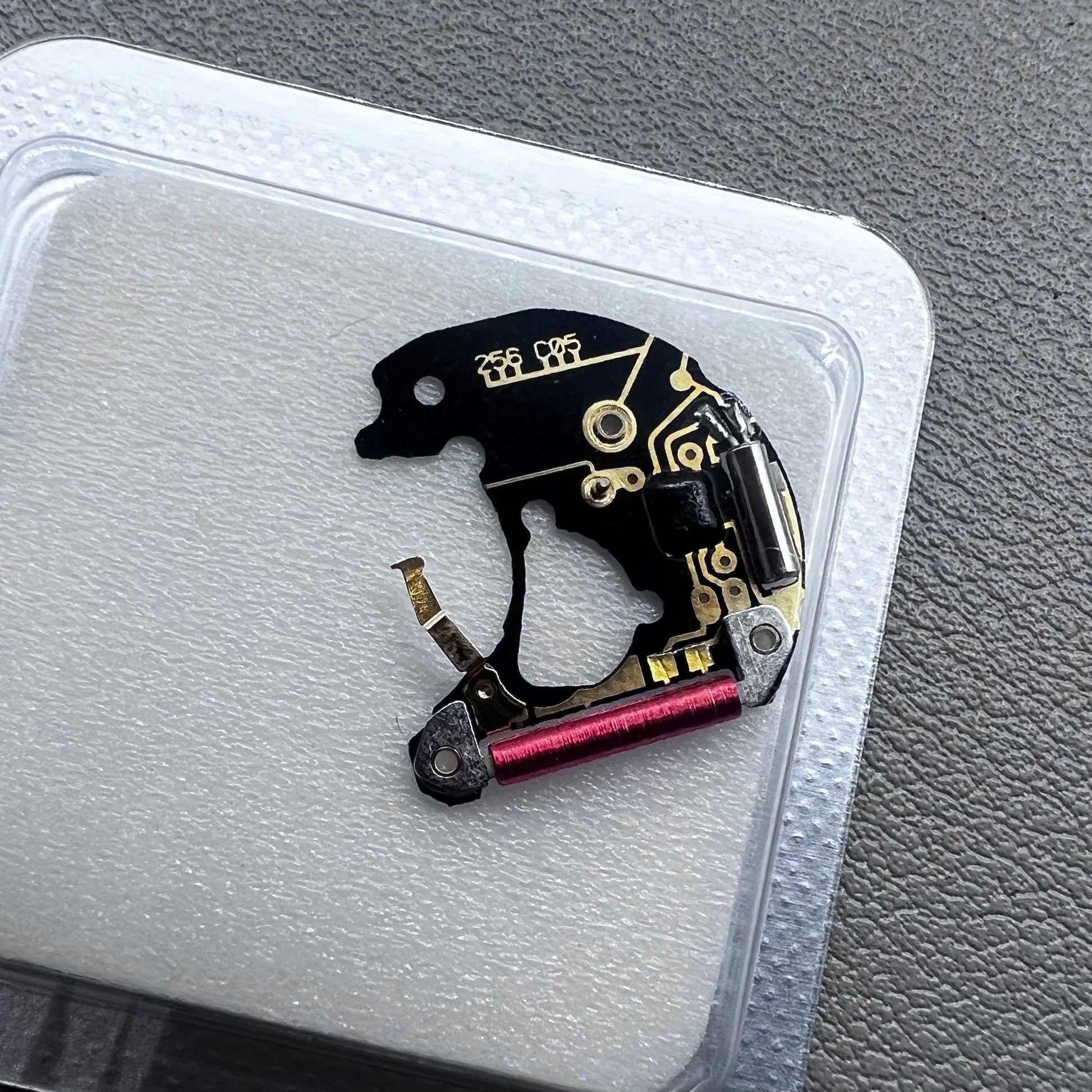 Circuit board for ETA 256.111 watch movement, precise replacement, essential watch accessory.
