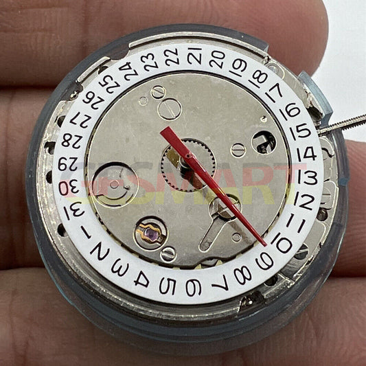 DG2813 automatic mechanical watch movement with silver finish, three hands, and single calendar display.