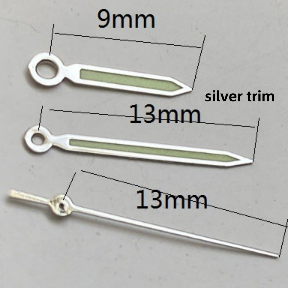 Silver trimmed green luminous watch hands set for Ronda 515 quartz movement, enhancing readability and style.