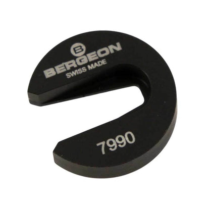 Bergeon 7990 tool supporting balance wheel impulse-pin for precise watch cleaning.