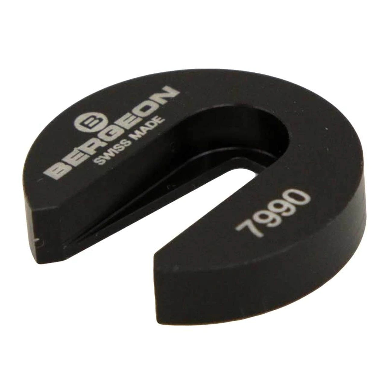 Bergeon 7990 tool holding balance wheel impulse-pin for precise watch cleaning.