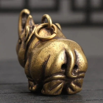 Hand-carved vintage copper rhinoceros figurine, perfect for watch accessory display.