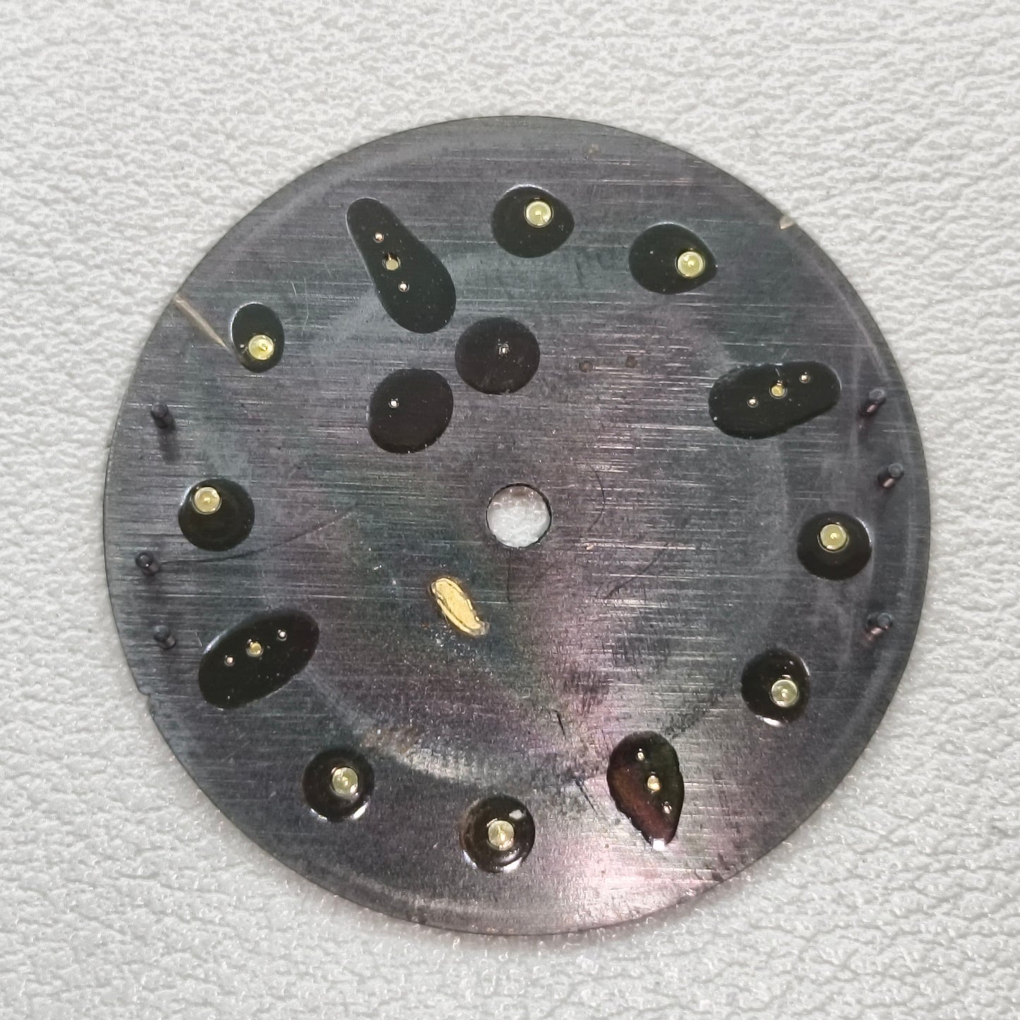 watch dial with S logo