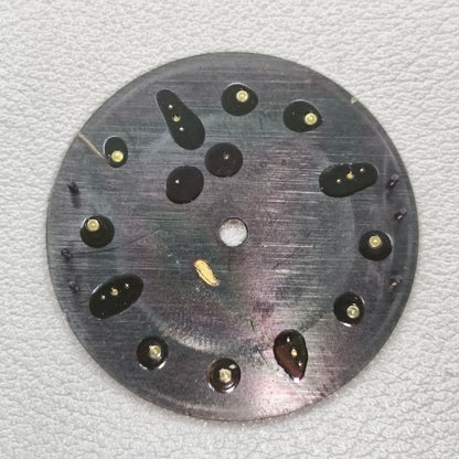 watch dial with S logo