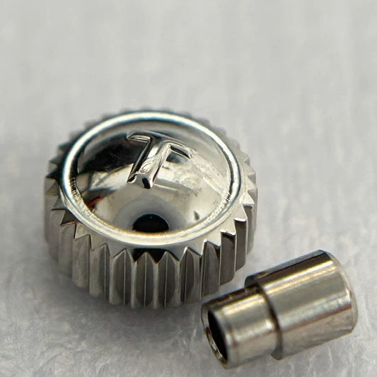 Steel silver watch crown for Tissot T101, durable replacement part for precise adjustments.