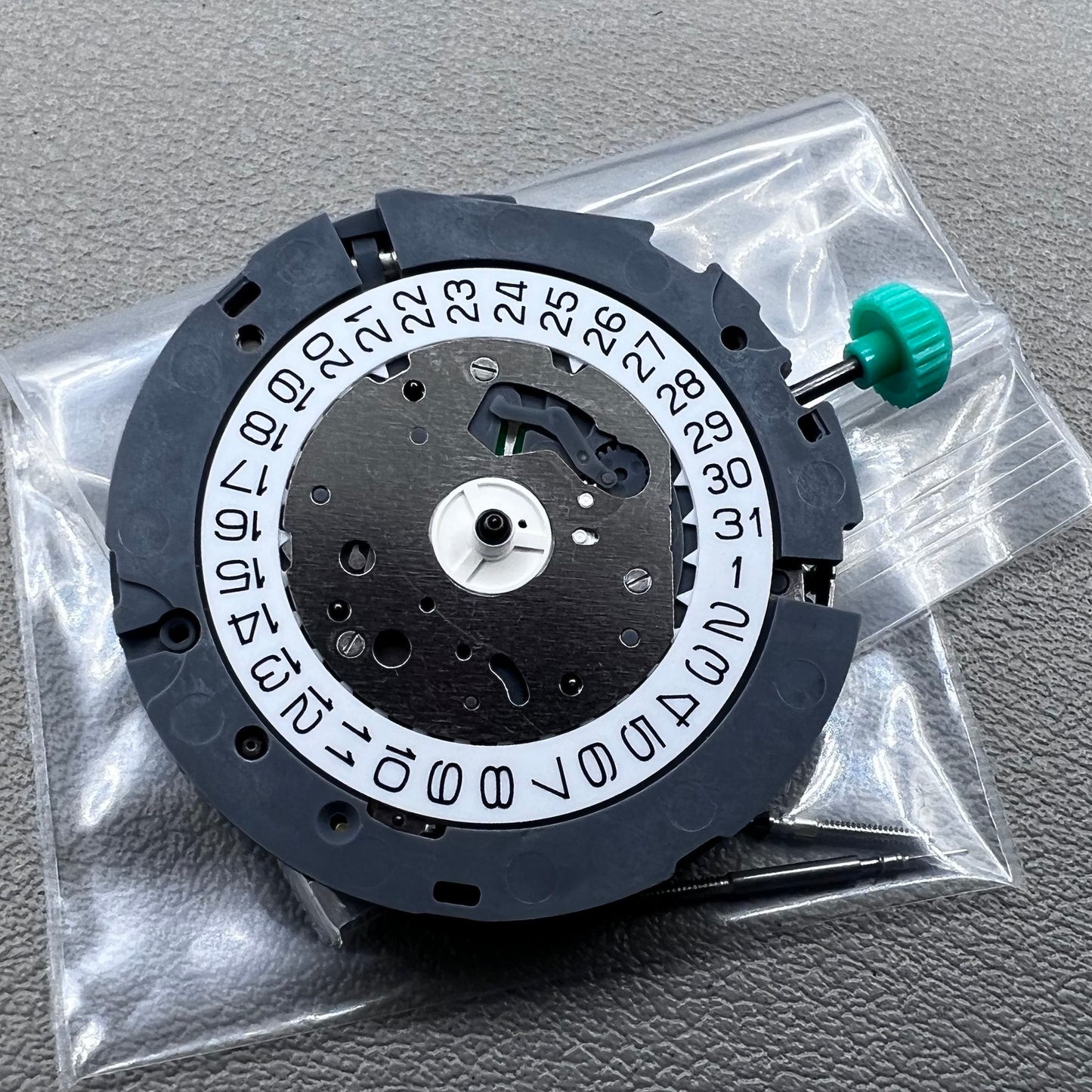 Japan Miyota 0S80 quartz watch movement with date, 1/20 chrono, alarm, and 3 sub-dials for precision timing.