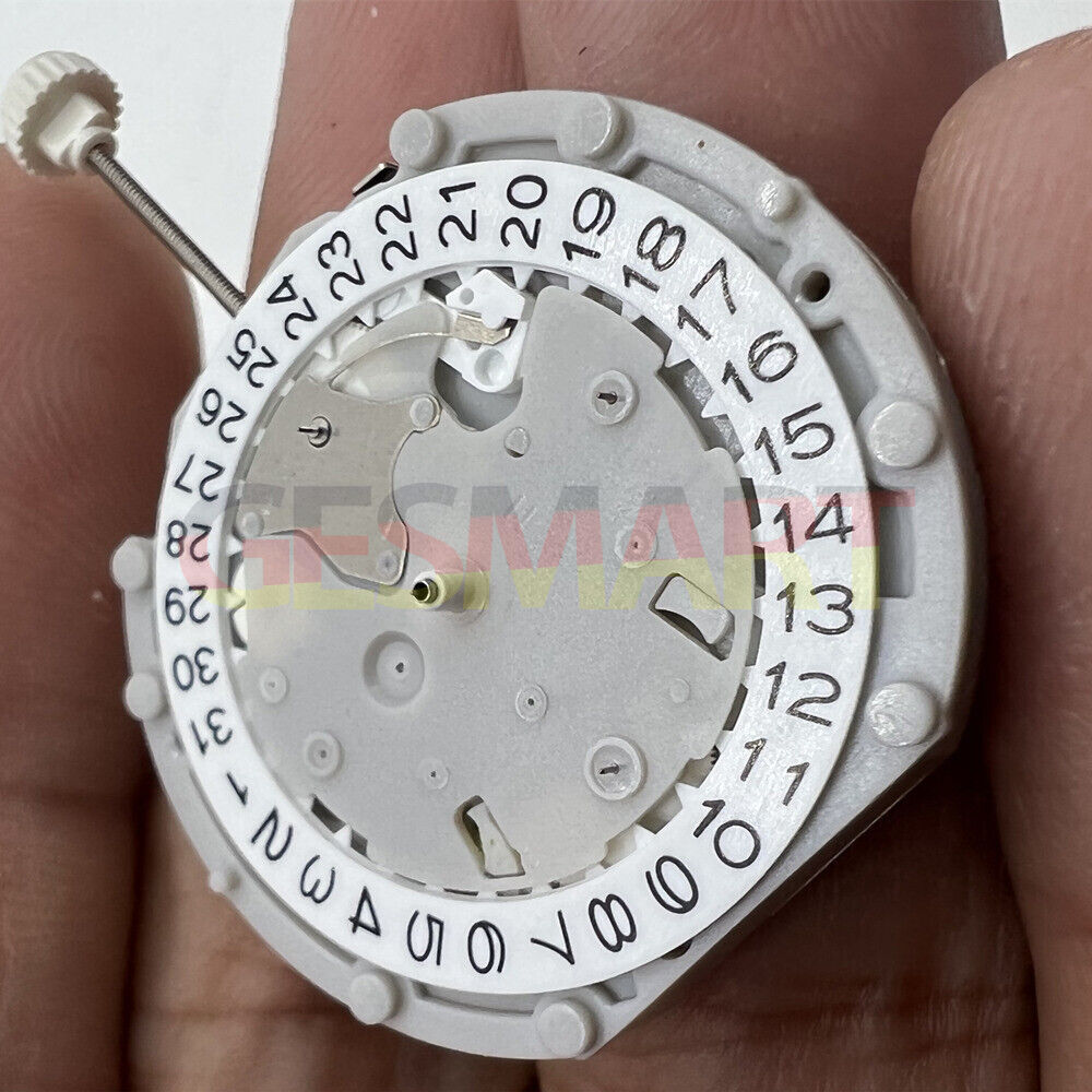 Sunon PE70 quartz watch movement with 3 hands, 3 sub-dials, date display at 3 and 6 o'clock positions.