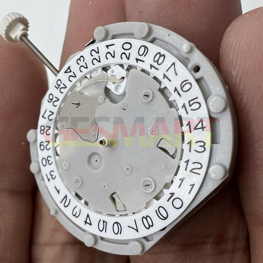 Sunon PE70 quartz watch movement with 3 hands, 3 sub-dials, date display at 3 and 6 o'clock positions.