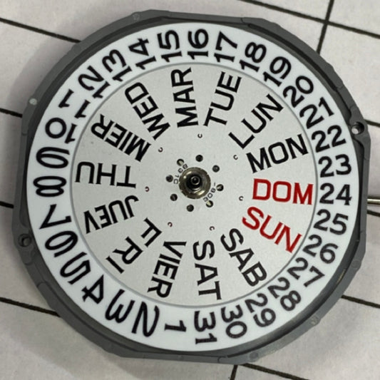 Japan-made Miyota 2405 quartz watch part with double calendar for precise timekeeping and date display.