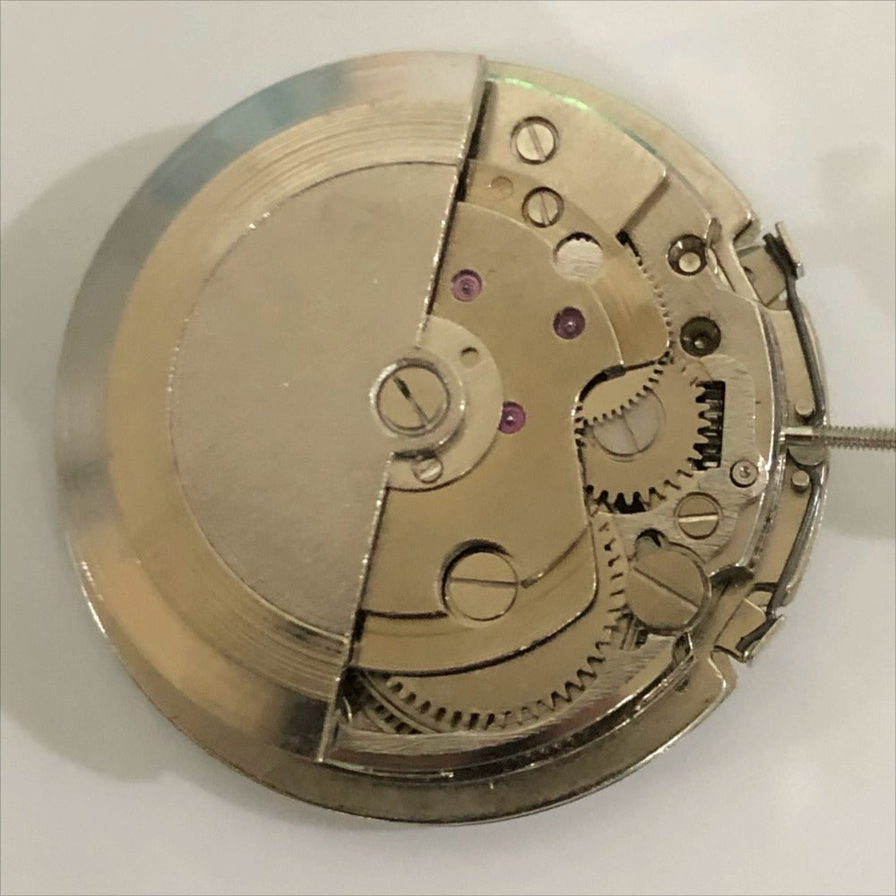 China Made 7120 mechanical watch movement with date display at 3 o'clock, three-hand design.